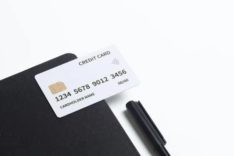 Office desk with flat top view, white desk. Workspace with green credit car.. Stock Photos