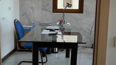 Office desk with laptop and documents Stock Footage 86353646