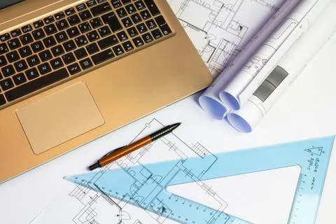 An office desk with the project papers Stock Photos