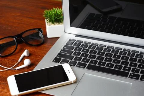 Office desk table with computer and supplies Stock Photos
