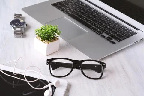 Office desk table with computer and supplies Stock Photos