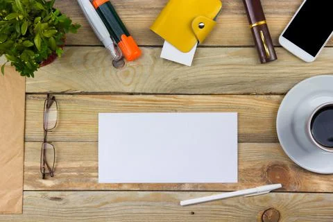 Office desk table with computer, pen and a cup of coffee, lot of things. To.. Stock Photos