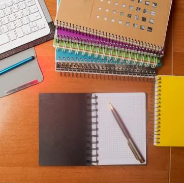 Office desk table with computer, supplies, flower Stock Photos