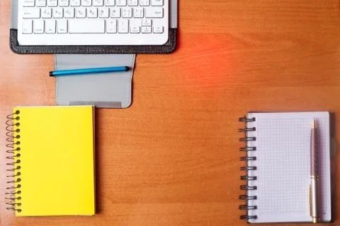 Office desk table with computer, supplies. Stock Photos