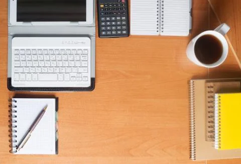 Office desk table with computer, supplies. Stock Photos