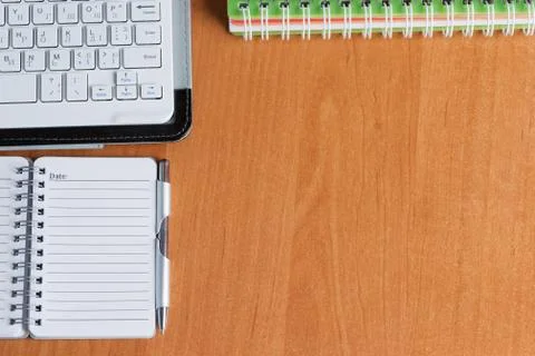 Office desk table with computer, supplies. Stock Photos
