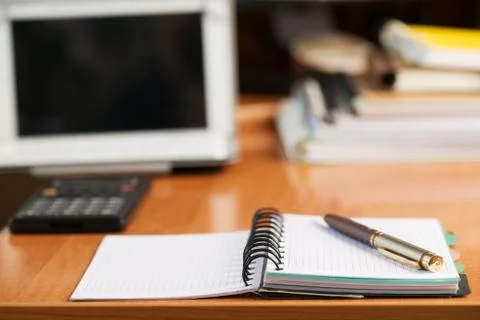 Office desk table with computer, supplies. Stock Photos