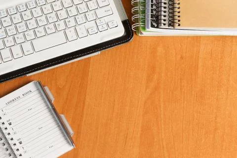 Office desk table with computer, supplies. Stock Photos