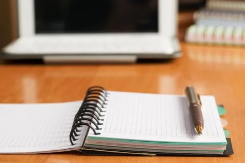 Office desk table with computer, supplies. Stock Photos