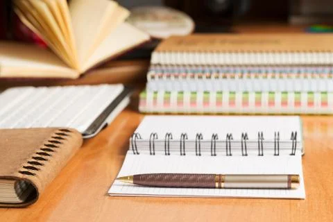 Office desk table with computer, supplies. Stock Photos