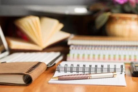Office desk table with computer, supplies, flower Stock Photos