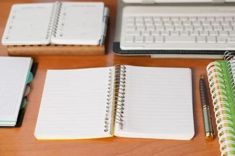 Office desk table with computer, supplies. Stock Photos