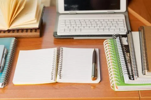 Office desk table with computer, supplies. Stock Photos