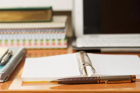 Office desk table with computer, supplies. Stock Photos