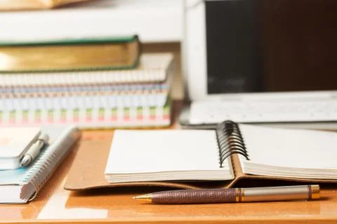 Office desk table with computer, supplies. Stock Photos