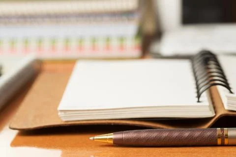 Office desk table with computer, supplies. Stock Photos