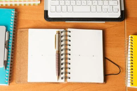 Office desk table with computer, supplies. Stock Photos