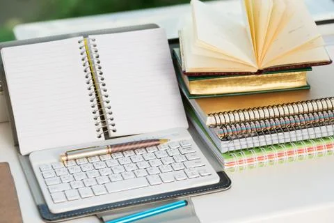 Office desk table with computer, supplies. Stock Photos