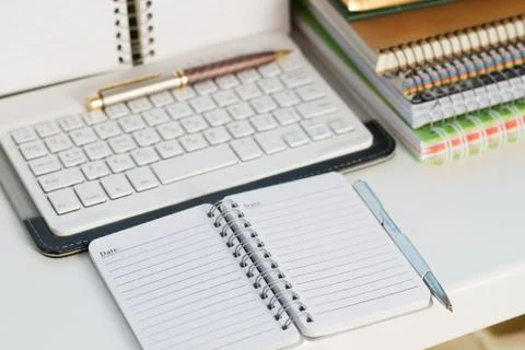 Office desk table with computer, supplies. Stock Photos