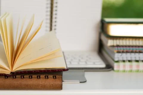 Office desk table with computer, supplies. Stock Photos
