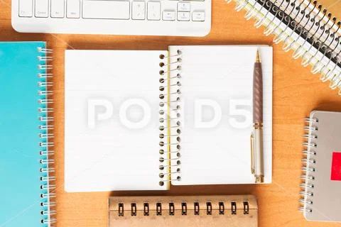 Office desk table with computer, supplies. Stock Photos