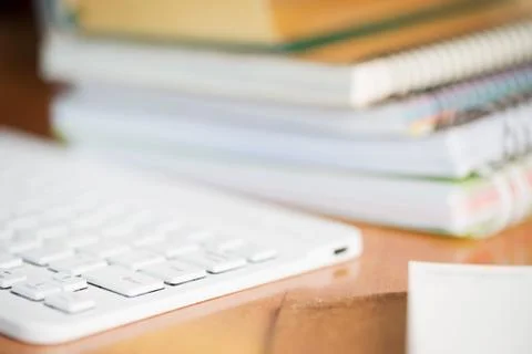 Office desk table with computer, supplies. Stock Photos