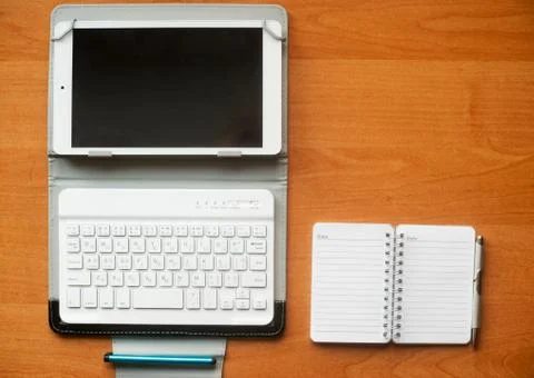 Office desk table with computer, supplies. Stock Photos