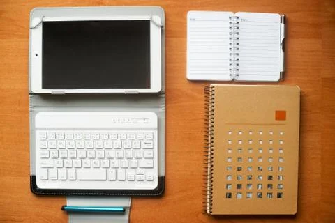 Office desk table with computer, supplies. Stock Photos