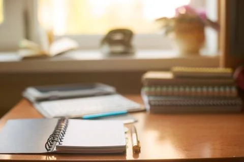 Office desk table with computer, supplies, flower Stock Photos