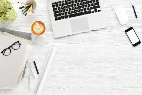 Office desk table with labtop computer,blank magazine smart phone ,eyeglasses Stock Illustration