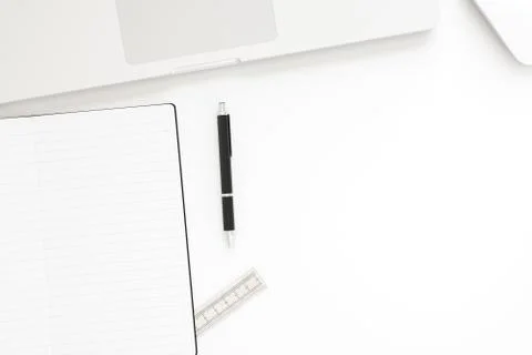 Office desk table with labtop computer,blank notebook and pen. Top view with Stock Illustration