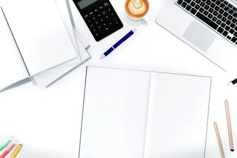 Office desk table with labtop computer,blank magazinesmart phone and coffee cup Stock Photos