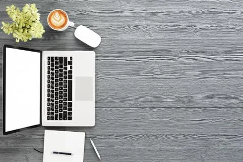 Office desk table with labtop computer,blank magazine smart phone and coffee cup Stock Photos