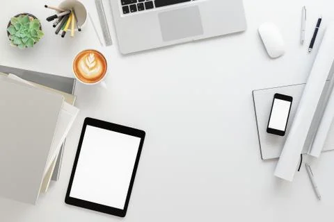 Office desk table with labtop computer,blank magazine smart phone and coffee cup Foto stock