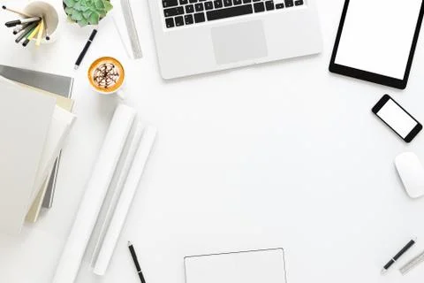 Office desk table with labtop computer,blank magazine smart phone and coffee cup Stock Photos