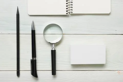 Office desk table with supplies and coffee cup. Top view. Copy space for text Photos