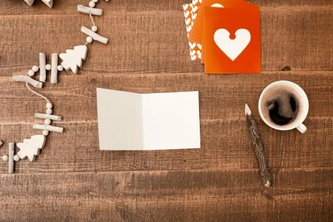 Office desk table. Top view with blank greeting card, pencil, christmas decor Stock Photos