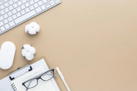 Office desk table top view with office supply, Beige table with copy space, B Foto stock