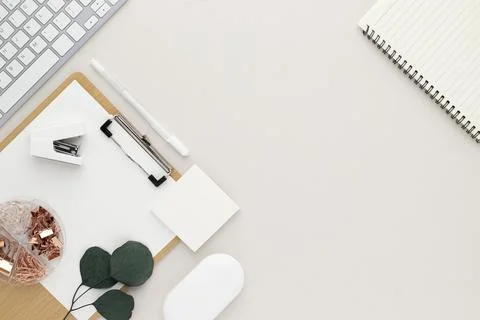 Office desk table top view with office supply, beige table with copy space, b Stock Photos
