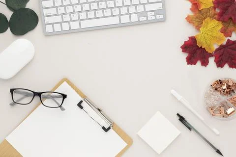 Office desk table top view with office supply, beige table with copy space, b Foto stock