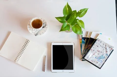 Office desk in work place with soft light Stock Photos