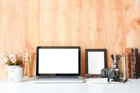 Office desk Work space stuff with notepad, laptop and coffee cup mouse notepa Stock Photos