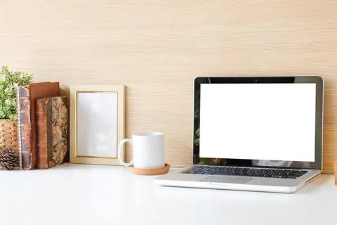Office desk Work space stuff with notepad, laptop and coffee cup mouse notepa Stock-Fotos