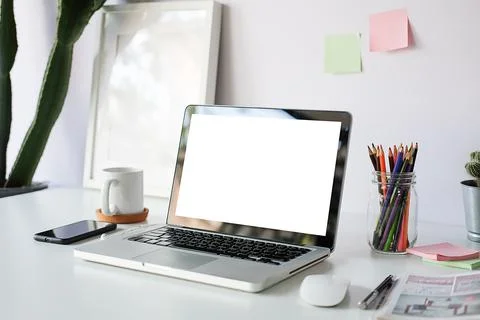 Office desk Work space stuff with notepad, laptop and coffee cup mouse notepa Stock Photos
