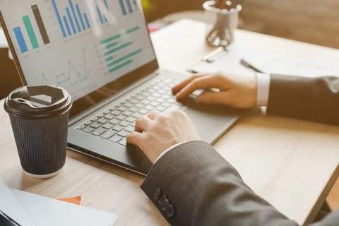 Office desktop with laptop analytics . High quality and resolution beautiful Stock Photos