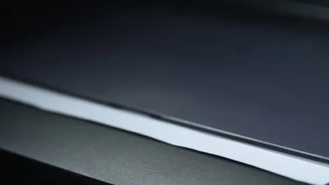 Office desktop laser printer output tray, single A4 letter printed page com.. Video stock 284661094