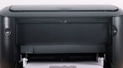 Office desktop laser printer printing single A4 letter page Video stock 65016245