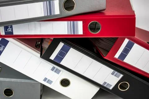 Office document filing cabinets of different colors on white background Stock Photos