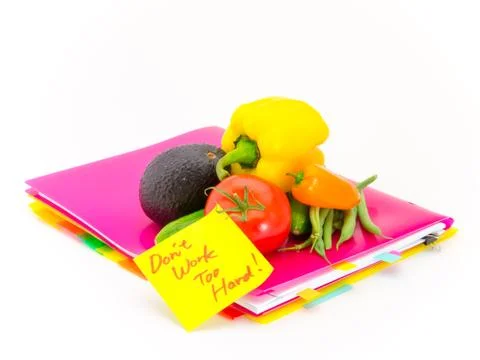 Office Documents and Vegetables; Don't Work Too Hard Stock Photos