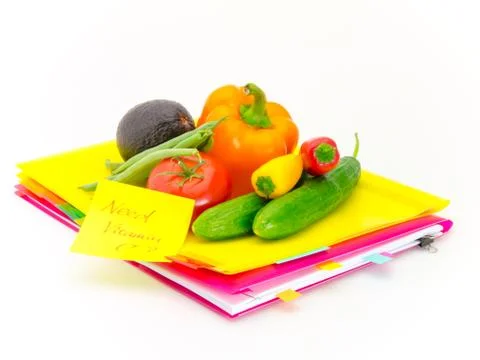 Office Documents and Vegetables; Need Vitamin C Stock Photos